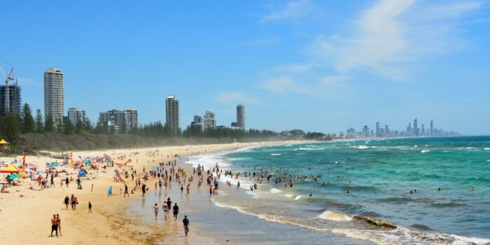 Burleigh Heads, Gold Coast, Queensland, Australia - January 13, 2018. Beach in Burleigh Heads, with buildings and people.